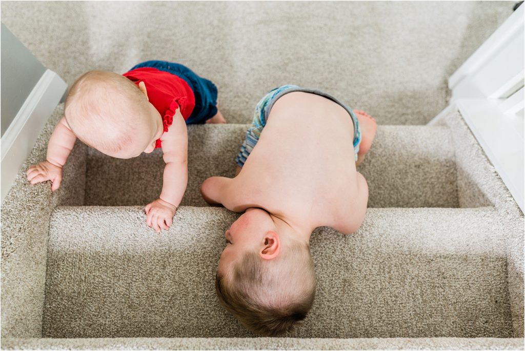 Overhead photo of siblings playing on a step
