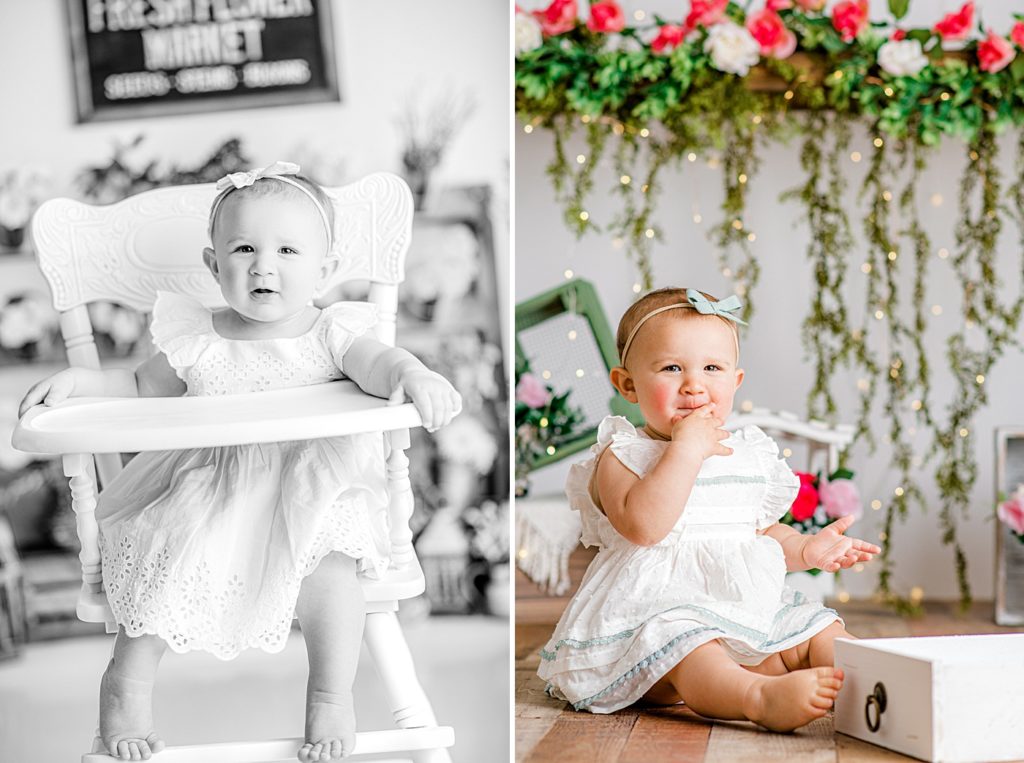 Baby in front of a beautiful floral backdrop for her cake smash photos.