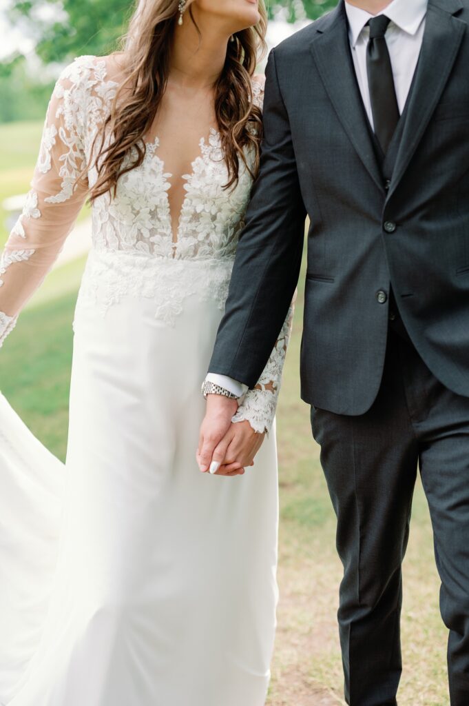 Bride and Groom Portraits for their wedding at Greystone Golf Club (up close of them holding hands)